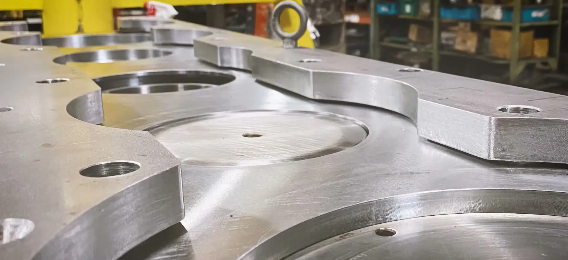 Precision-machined progressive die faces on the tool room bench